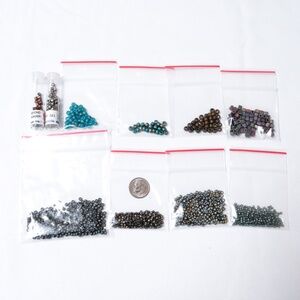 Group of Myuki glass beads, new but not in original packaging